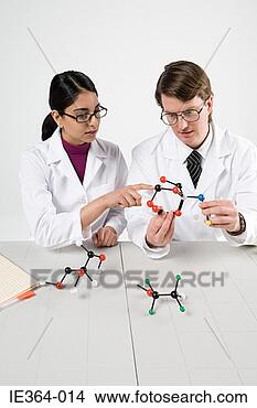 Stock Photo - scientists with 
molecule models. 
fotosearch - search 
stock photos, 
pictures, images, 
and photo clipart