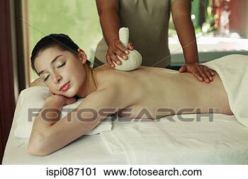 Stock Photography - woman enjoying 
a back massage. 
fotosearch - search 
stock photos, 
pictures, images, 
and photo clipart