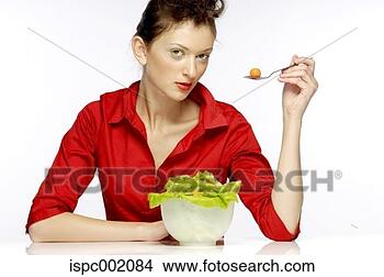 Stock Photo - woman enjoying 
a bowl of salad. 
fotosearch - search 
stock photos, 
pictures, images, 
and photo clipart