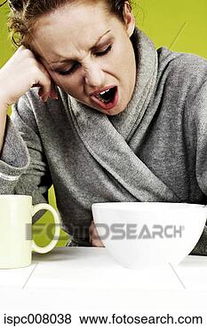 Stock Photo - sleepy woman yawning.  fotosearch - search  stock photos,  pictures, images,  and photo clipart