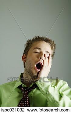 Stock Photo - businessman yawning. 
fotosearch - search 
stock photos, 
pictures, images, 
and photo clipart