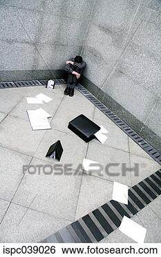 Stock Photo - businessman sitting 
at the corner 
of a building. 
fotosearch - search 
stock photos, 
pictures, images, 
and photo clipart