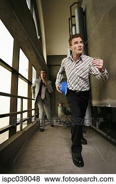 Stock Photo - engineers rushing 
to work. fotosearch 
- search stock 
photos, pictures, 
images, and photo 
clipart
