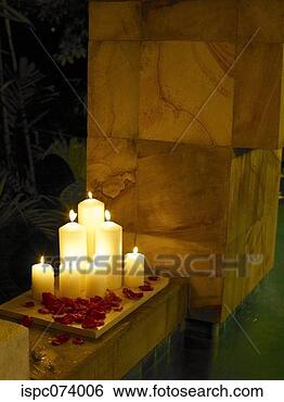 Stock Photo - lit candles beside 
pool. fotosearch 
- search stock 
photos, pictures, 
images, and photo 
clipart