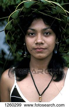 Stock Photograph - a portrait of 
a young woman 
wearing a hat 
made from woven 
leaves. fotosearch 
- search stock 
photos, pictures, 
images, and photo 
clipart