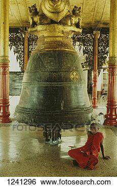 Stock Photo - a boy sitting 
on the floor in 
the shwedagon 
pagoda, rangoon, 
myanmar. fotosearch 
- search stock 
photos, pictures, 
images, and photo 
clipart