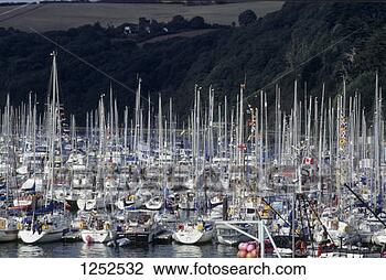 Stock Photo - sailboats moored 
in the harbour 
at dartmouth, 
england. fotosearch 
- search stock 
photos, pictures, 
images, and photo 
clipart