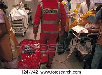 Stock Photo - the trauma team 
at accident & 
emergency treating 
a road accident. 
fotosearch - search 
stock photos, 
pictures, images, 
and photo clipart