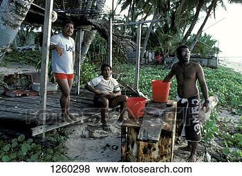 Stock Photo - fishermen gutting 
fish on the beach, 
nauru. fotosearch 
- search stock 
photos, pictures, 
images, and photo 
clipart