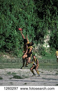 Picture - men playing football 
with australian 
rules, nauru. 
fotosearch - search 
stock photos, 
pictures, images, 
and photo clipart