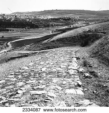 Picture - old road on the 
way to matera, 
basilicata, italy. 
fotosearch - search 
stock photos, 
pictures, images, 
and photo clipart
