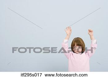 Picture - girl with arms 
raised. fotosearch 
- search stock 
photos, pictures, 
images, and photo 
clipart
