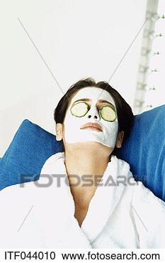 Stock Photography - portrait of a 
woman wearing 
a face mask. fotosearch 
- search stock 
photos, pictures, 
images, and photo 
clipart