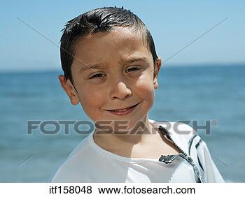 Stock Photo - boy posing by 
ocean. fotosearch 
- search stock 
photos, pictures, 
images, and photo 
clipart