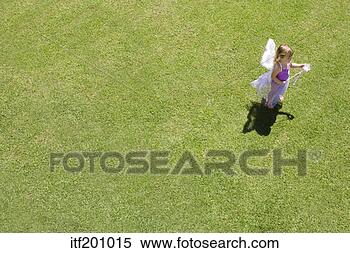 Stock Image - high angle view 
of girl in fairy 
costume. fotosearch 
- search stock 
photos, pictures, 
images, and photo 
clipart