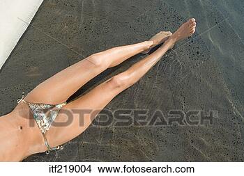 Stock Photo - torso of woman 
with bikini bottom 
on. fotosearch 
- search stock 
photos, pictures, 
images, and photo 
clipart