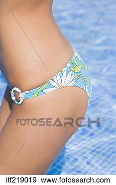 Stock Photograph - woman standing 
with bikini bottom 
on. fotosearch 
- search stock 
photos, pictures, 
images, and photo 
clipart