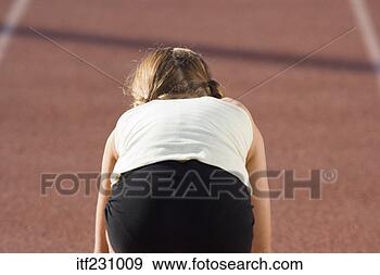 Stock Photograph - girl in starting 
position. fotosearch 
- search stock 
photos, pictures, 
images, and photo 
clipart