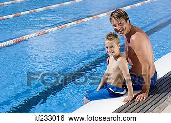 Stock Photo - father and son 
sitting at poolside. 
fotosearch - search 
stock photos, 
pictures, images, 
and photo clipart