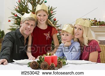Stock Photo - family wearing 
crowns on their 
heads. fotosearch 
- search stock 
photos, pictures, 
images, and photo 
clipart