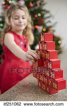 Stock Photo - girl with advent 
calendar. fotosearch 
- search stock 
photos, pictures, 
images, and photo 
clipart