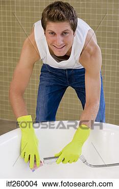 man-cleaning-bathtub_~itf260004.jpg