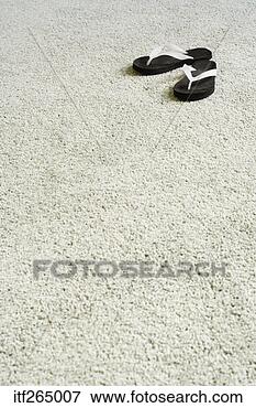 Picture - sandals on carpet. 
fotosearch - search 
stock photos, 
pictures, images, 
and photo clipart