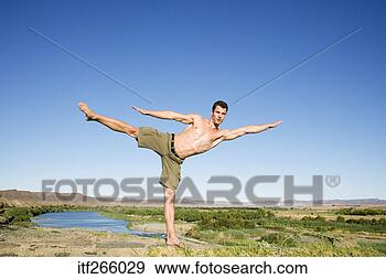 Stock Photograph - man in yoga pose. 
fotosearch - search 
stock photos, 
pictures, images, 
and photo clipart