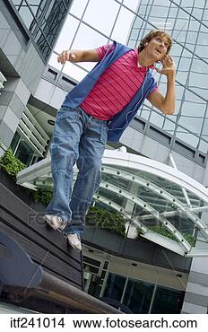 Stock Photo - boy dancing outdoors. 
fotosearch - search 
stock photos, 
pictures, images, 
and photo clipart