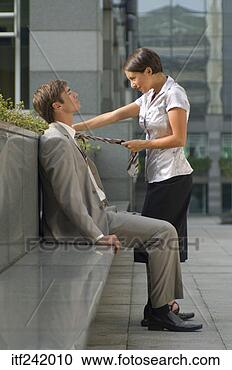 Stock Photography - playful woman 
seducing man. 
fotosearch - search 
stock photos, 
pictures, images, 
and photo clipart