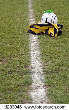 Stock Photo - soccer equipment 
on a field. fotosearch 
- search stock 
photos, pictures, 
images, and photo 
clipart