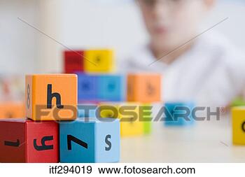Stock Photograph - boy by alphabet 
cubes. fotosearch 
- search stock 
photos, pictures, 
images, and photo 
clipart