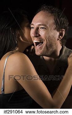 Stock Photo - man and woman 
hugging. fotosearch 
- search stock 
photos, pictures, 
images, and photo 
clipart