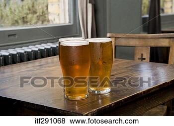 Stock Photo - three pints of 
beer. fotosearch 
- search stock 
photos, pictures, 
images, and photo 
clipart