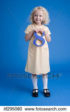 Stock Photography - girl holding number. 
fotosearch - search 
stock photos, 
pictures, images, 
and photo clipart
