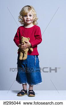 Stock Photo - girl with stuffed 
animal. fotosearch 
- search stock 
photos, pictures, 
images, and photo 
clipart