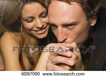 Stock Photography - man kissing hand 
of woman. fotosearch 
- search stock 
photos, pictures, 
images, and photo 
clipart