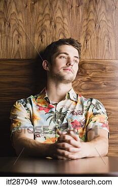 Stock Photograph - pensive man wearing 
hawaiian shirt. 
fotosearch - search 
stock photos, 
pictures, images, 
and photo clipart