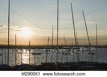 Stock Photography - boats sailing 
at dawn. fotosearch 
- search stock 
photos, pictures, 
images, and photo 
clipart