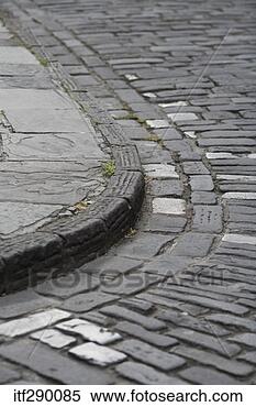Stock Image - cobblestone street 
corner. fotosearch 
- search stock 
photos, pictures, 
images, and photo 
clipart