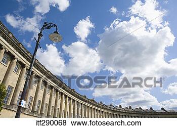 Stock Photo - lamppost by building. 
fotosearch - search 
stock photos, 
pictures, images, 
and photo clipart