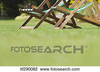 Stock Photo - lawn chairs in 
garden. fotosearch 
- search stock 
photos, pictures, 
images, and photo 
clipart