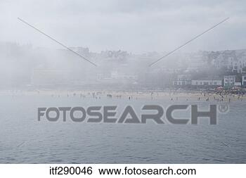 Stock Photo - misty beach. fotosearch 
- search stock 
photos, pictures, 
images, and photo 
clipart