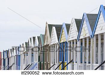 Stock Photo - row of beach huts. 
fotosearch - search 
stock photos, 
pictures, images, 
and photo clipart