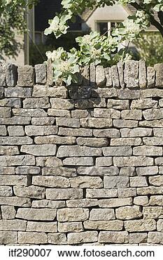 Picture - stone wall covering 
house. fotosearch 
- search stock 
photos, pictures, 
images, and photo 
clipart