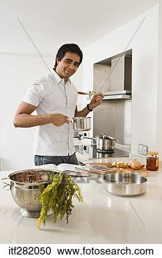 Stock Photography - man cooking. fotosearch 
- search stock 
photos, pictures, 
images, and photo 
clipart