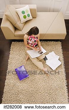 Stock Photo - woman with calculator 
and paperwork. 
fotosearch - search 
stock photos, 
pictures, images, 
and photo clipart