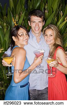 Stock Photo - friends smiling 
with drinks. fotosearch 
- search stock 
photos, pictures, 
images, and photo 
clipart