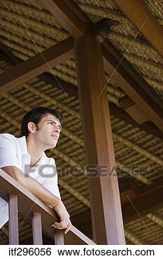 Stock Photo - pensive man on 
balcony. fotosearch 
- search stock 
photos, pictures, 
images, and photo 
clipart