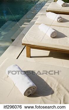 Stock Photo - poolside lounge 
chairs. fotosearch 
- search stock 
photos, pictures, 
images, and photo 
clipart